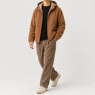 Man wearing brown fleece zip hoodie with cream fleece-lined hood, walking | Chaps London