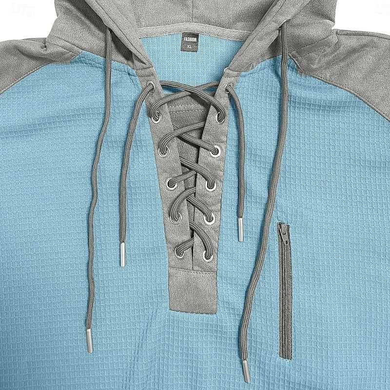 Light blue hoodie with gray lace-up neckline and zip pocket, close-up view | Chaps London
