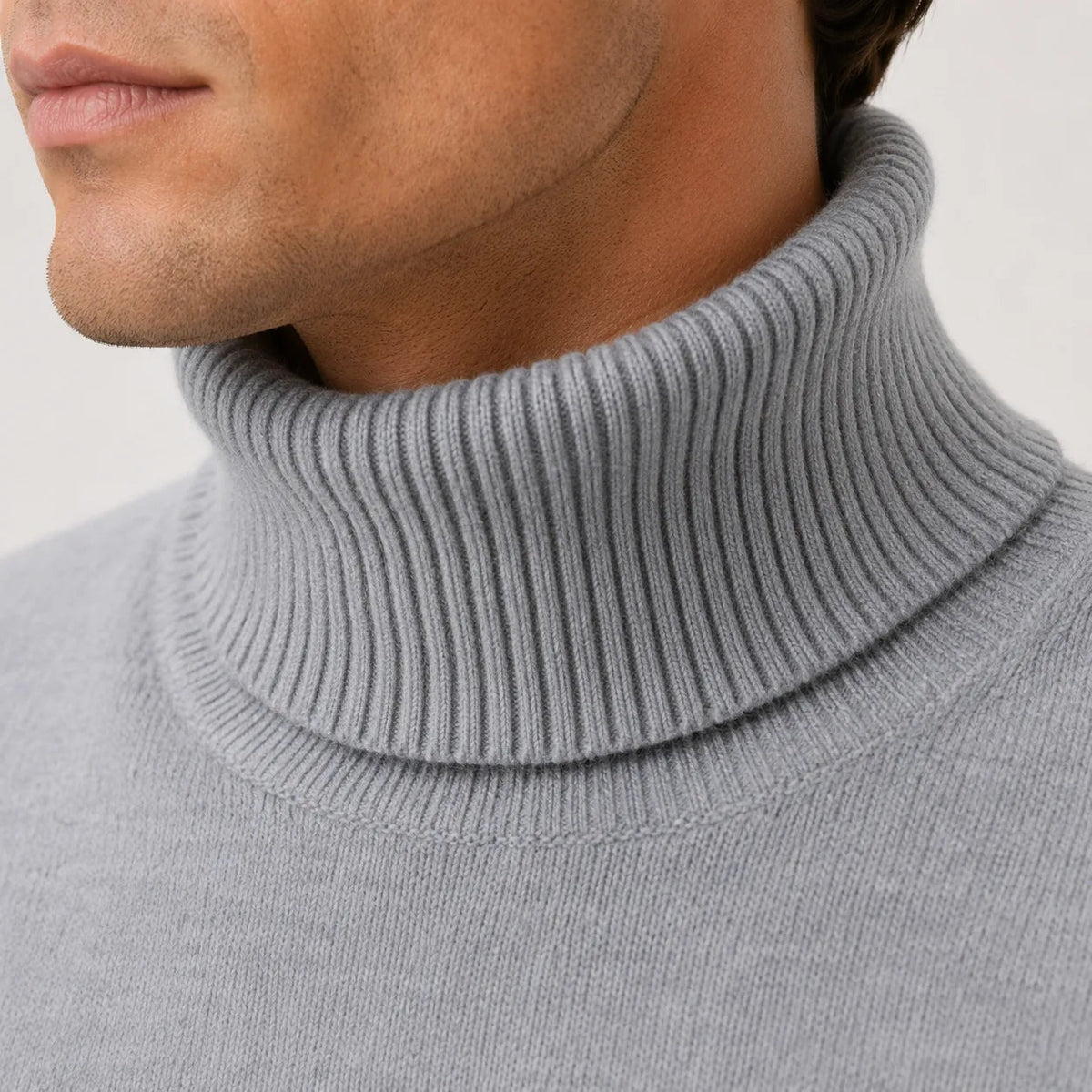 Gray ribbed turtleneck sweater worn by man, close-up fine knit detail | Chaps London