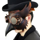 Brown steampunk owl plague doctor mask with goggle eyes, worn by person | Chaps London