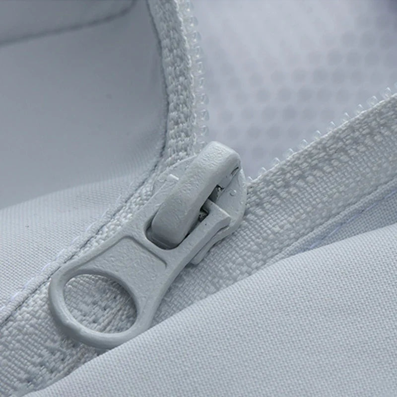 Close-up of white jacket zipper pull and fabric texture detail | Chaps London