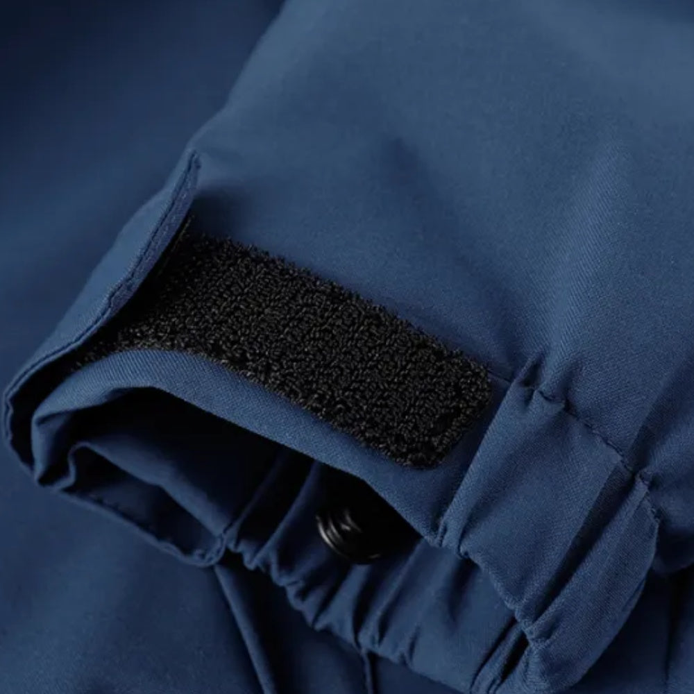 Navy blue jacket cuff close-up showing Velcro strap and snap button | Chaps London