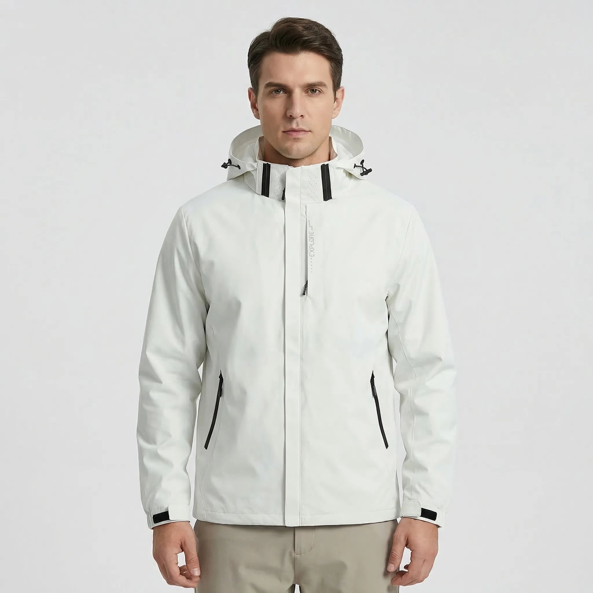 Man wearing white hooded rain jacket with black zipper accents, front view | Chaps London