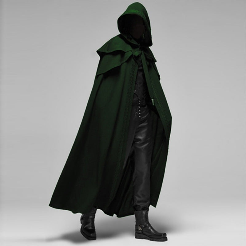 Model wearing dark green hooded cape with black pants and boots | Chaps London