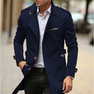 Navy blue slim-fit trench coat with epaulettes worn by man outdoors | Chaps London