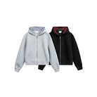 Gray and black zip hoodies with plaid lined hoods, flat lay | Chaps London
