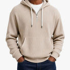 Beige ribbed half-zip hoodie worn by man with hands pockets | Chaps London