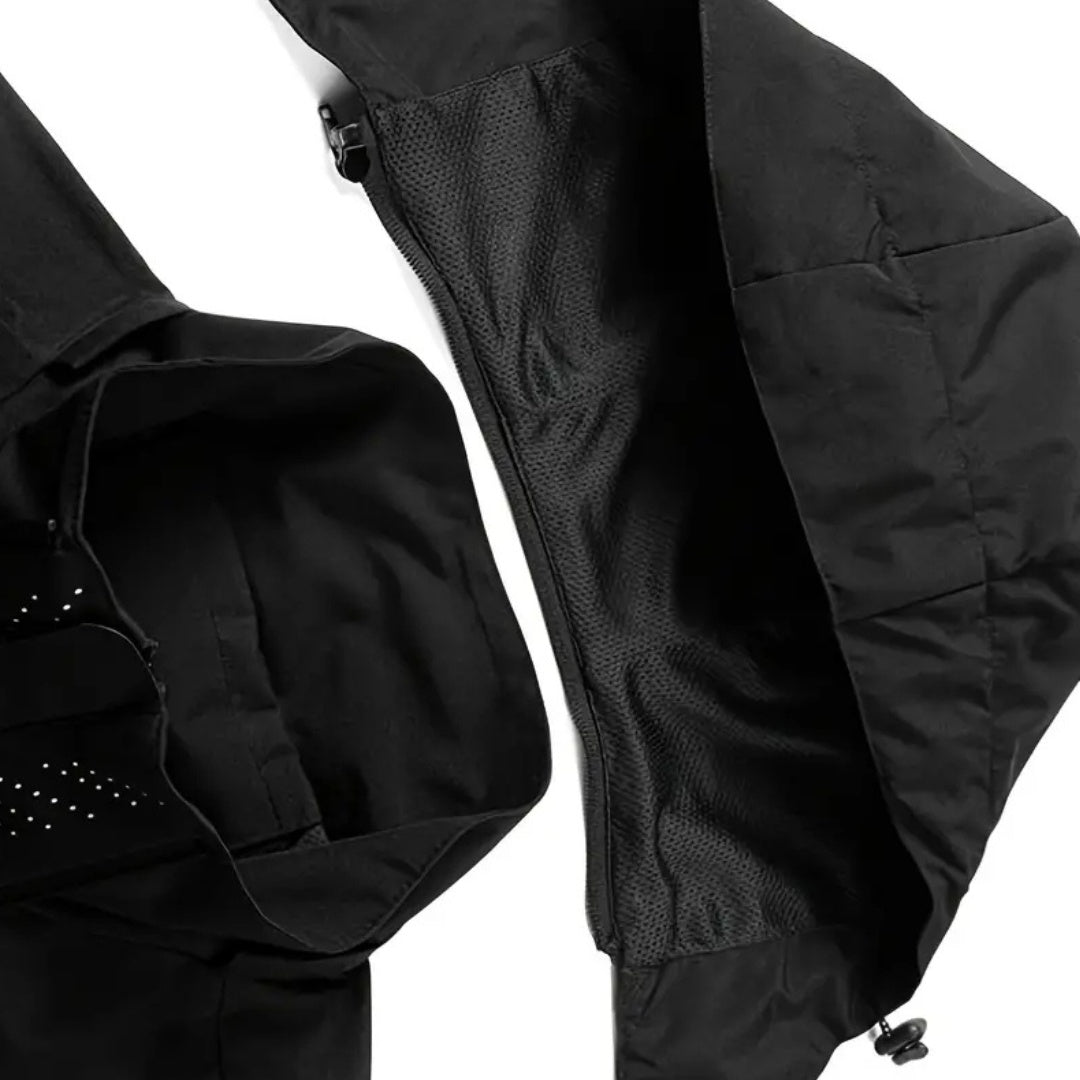 Black hooded rain jacket laid flat showing mesh lining and drawstring hem | Chaps London