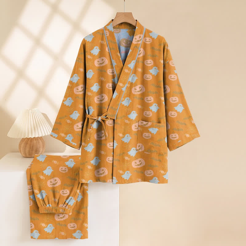 Orange kimono robe with ghost and pumpkin print, hanging on display | Chaps London