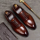 Brown lace-up oxford dress shoes with shoe trees, glossy finish, displayed together | Chaps London