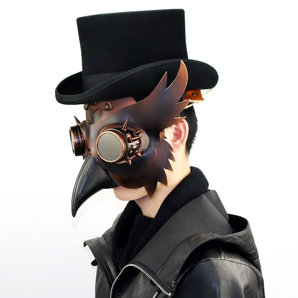 Man wearing black top hat with brown steampunk owl beak mask | Chaps London