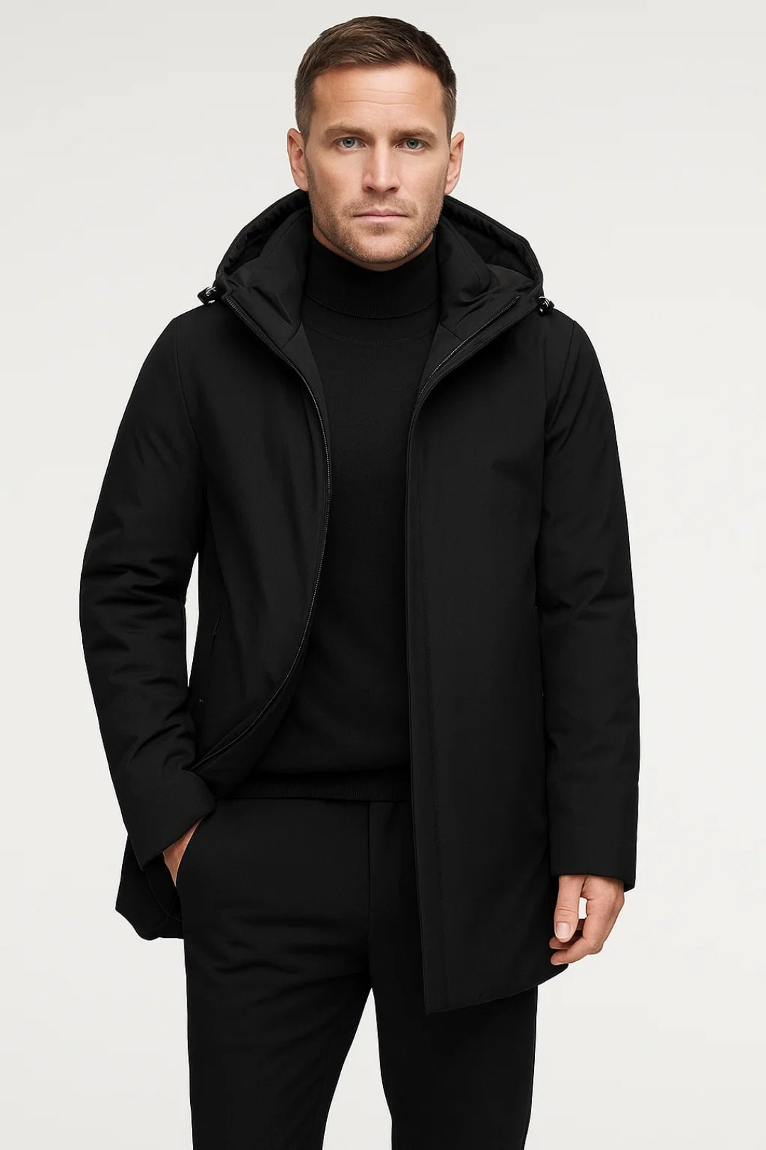 Man wearing black hooded parka with turtleneck sweater and trousers | Chaps London