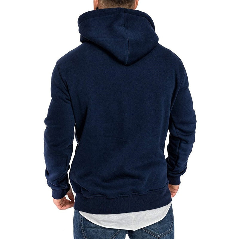 Man wearing navy blue hoodie, back view, layered white hem visible | Chaps London