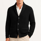 Man wearing black ribbed knit shawl collar cardigan with buttons and pockets | Chaps London