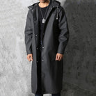 Man wearing long black hooded raincoat with front snap buttons | Chaps London