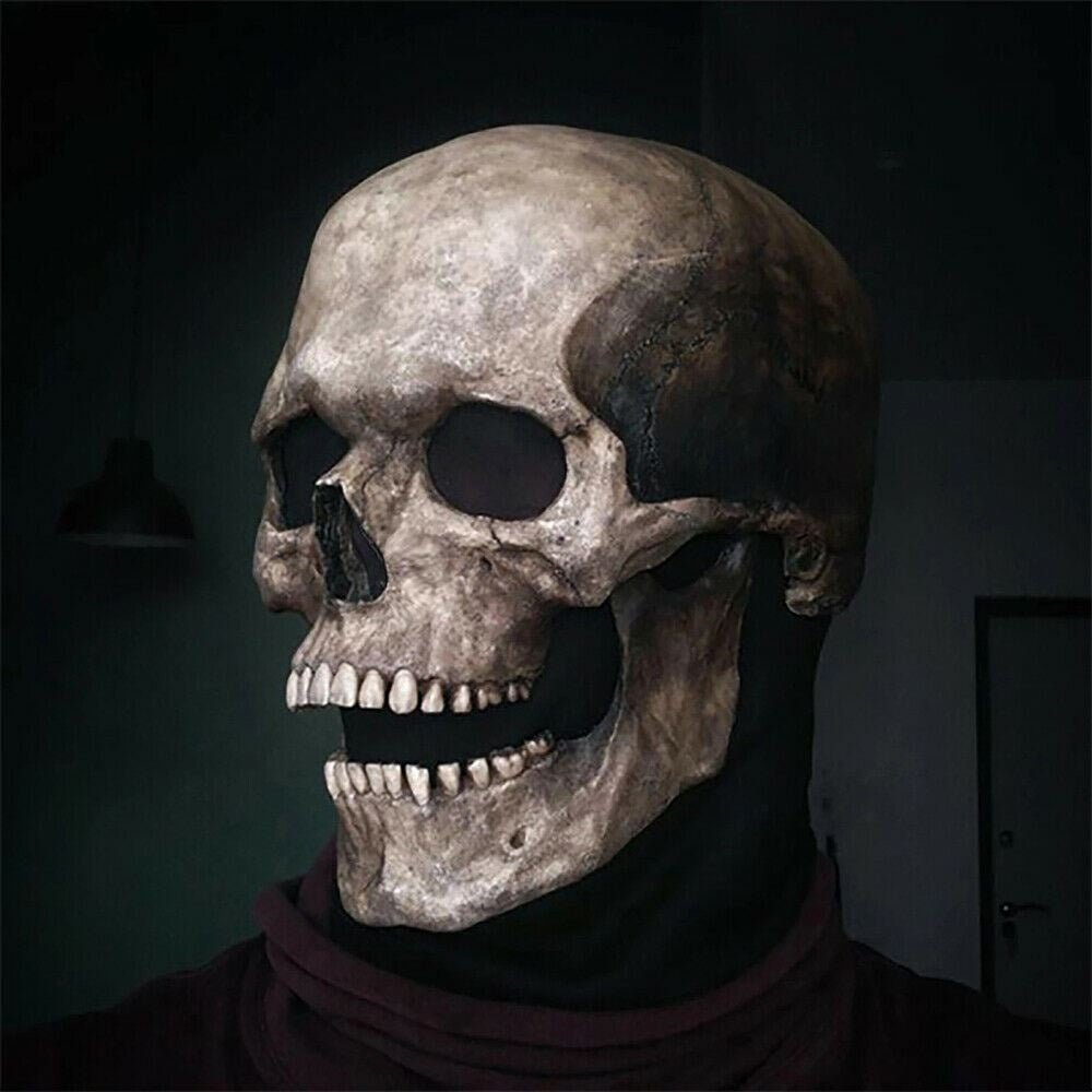 Grey skull mask with movable jaw worn by person indoors | Chaps London