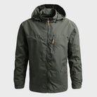 Dark green hooded rain jacket with zip pockets, shown on mannequin | Chaps London