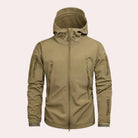 Khaki hooded softshell jacket with zip pockets, worn by a man, front view | Chaps London
