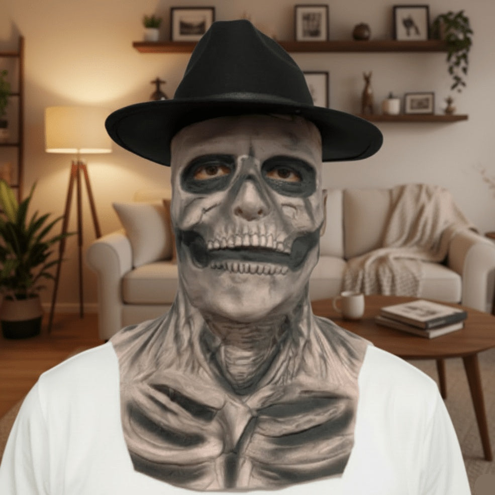 Gray latex skull mask worn by person with black fedora hat | Chaps London