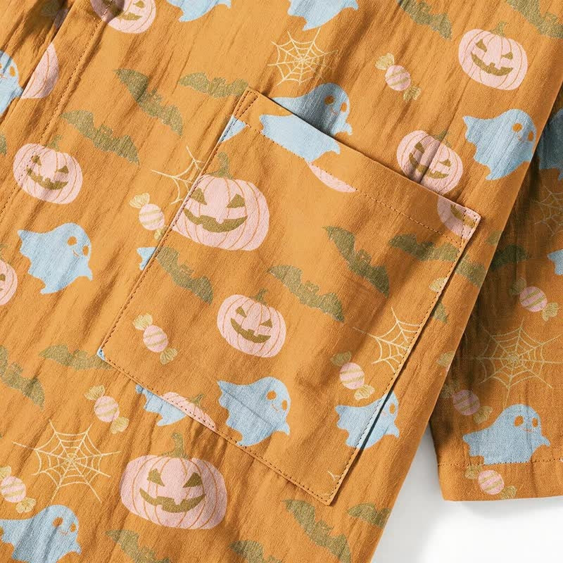 Mustard fabric close-up with pumpkin, ghost, bat print and patch pocket | Chaps London