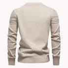 Beige knitted crew neck sweater worn by a person, back view | Chaps London