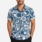 Man wearing blue floral shirt with white skull print, short sleeves, worn | Chaps London