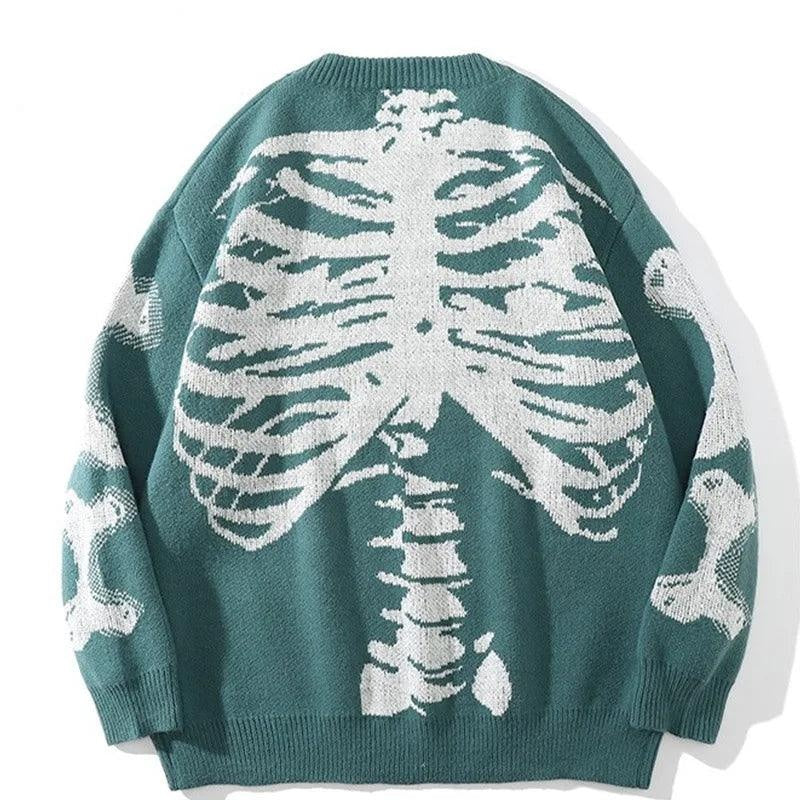 Green knit sweater worn by person, white ribcage and bone skeleton print | Chaps London