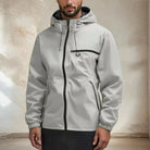 Man wearing light gray hooded rain jacket with front zip pocket | Chaps London