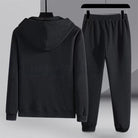 Black waffle-textured zip hoodie and matching joggers on hangers | Chaps London