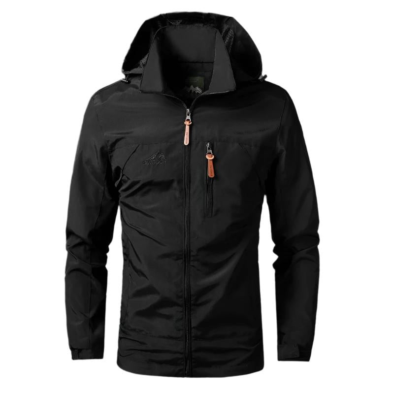 Black hooded zip-up jacket with chest pocket, worn by a person | Chaps London