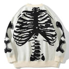 Cream knit sweater with black skeleton ribcage print, worn by person, back view | Chaps London