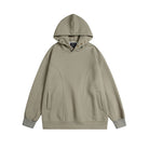 Beige oversized hoodie with snap neck and welt pockets, flat lay | Chaps London