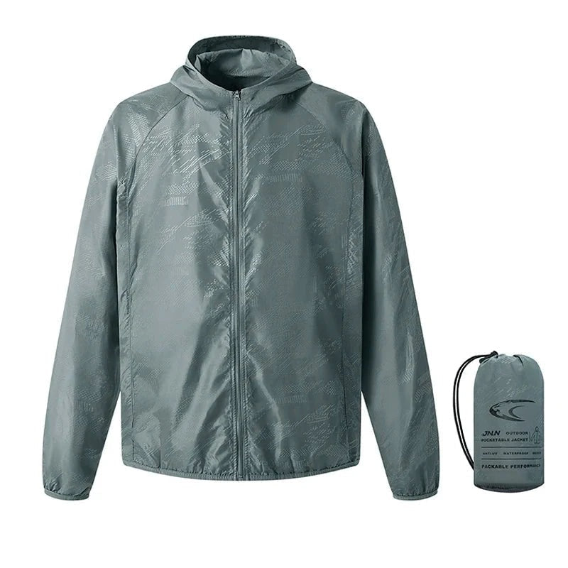 Gray hooded windbreaker jacket flat-laid with matching packable storage pouch | Chaps London