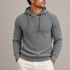 Gray basket weave knit hoodie with wooden toggle drawstrings, worn by man | Chaps London