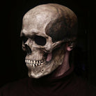 Realistic grey skull mask with movable jaw worn by person | Chaps London