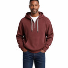 Man wearing maroon ribbed half-zip hoodie with white drawcords and jeans | Chaps London