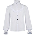 White ruffled high-collar shirt with black buttons and bishop sleeves, worn by model | Chaps London