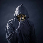 Grey skull mask with hood worn by person, finger raised | Chaps London