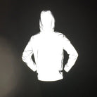 Man wearing reflective hooded jacket, back view, glowing white in darkness | Chaps London