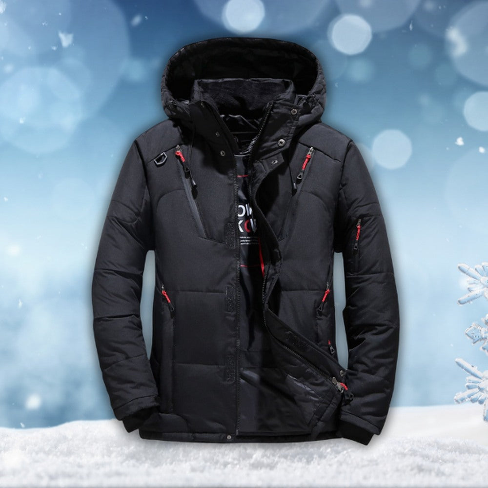 Black padded jacket with hood, zippered pockets, shown flat against snowy background | Chaps London