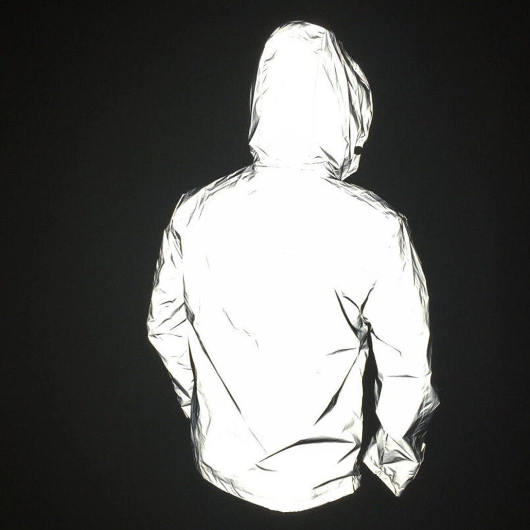 Man wearing reflective silver hooded jacket, back view, highly glossy textured fabric | Chaps London