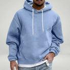 Light blue hoodie with white drawstrings, worn by a man, layered over white shirt | Chaps London