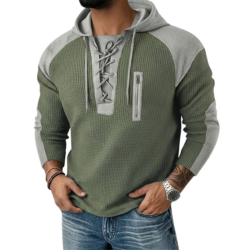 Green and grey lace-up hoodie with zipper pocket, worn by man | Chaps London