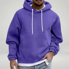 Man wearing purple hoodie with white drawstrings, layered over white shirt | Chaps London