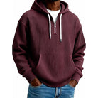 Burgundy ribbed half-zip hoodie worn by man with drawstrings | Chaps London