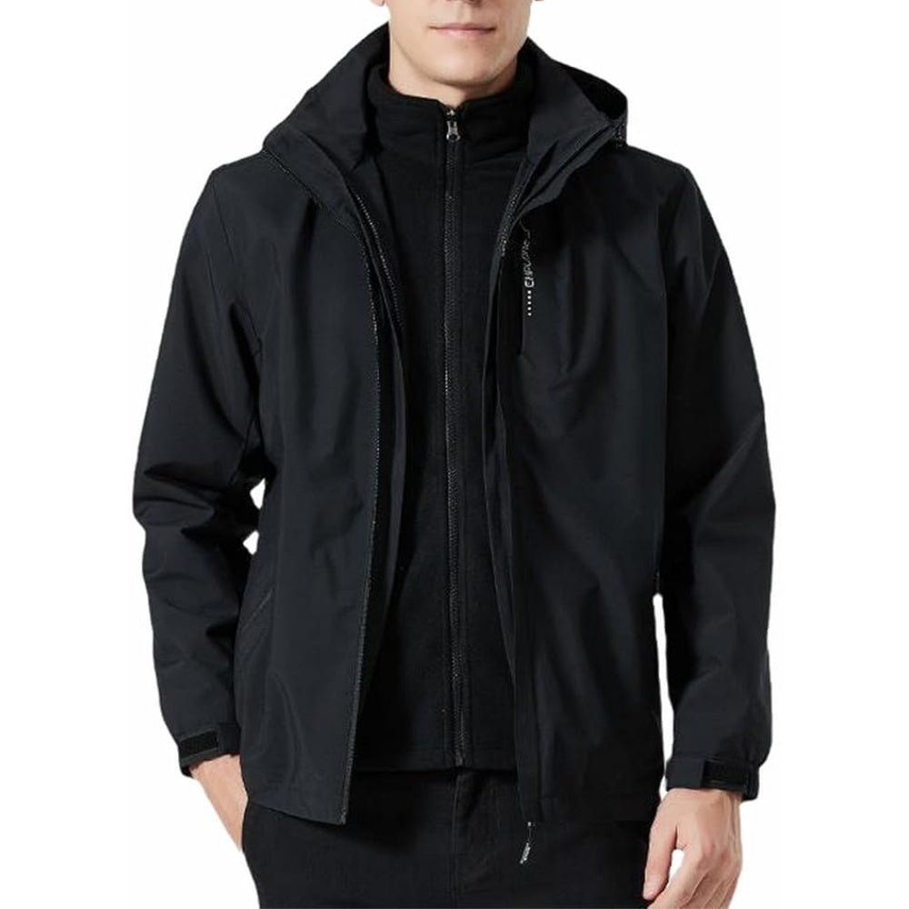 Man wearing black hooded waterproof jacket with zip pockets over layered top | Chaps London