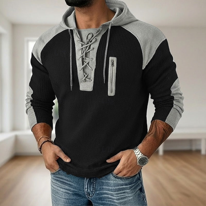 Black and gray lace-up hoodie with zipper detail, worn by man | Chaps London