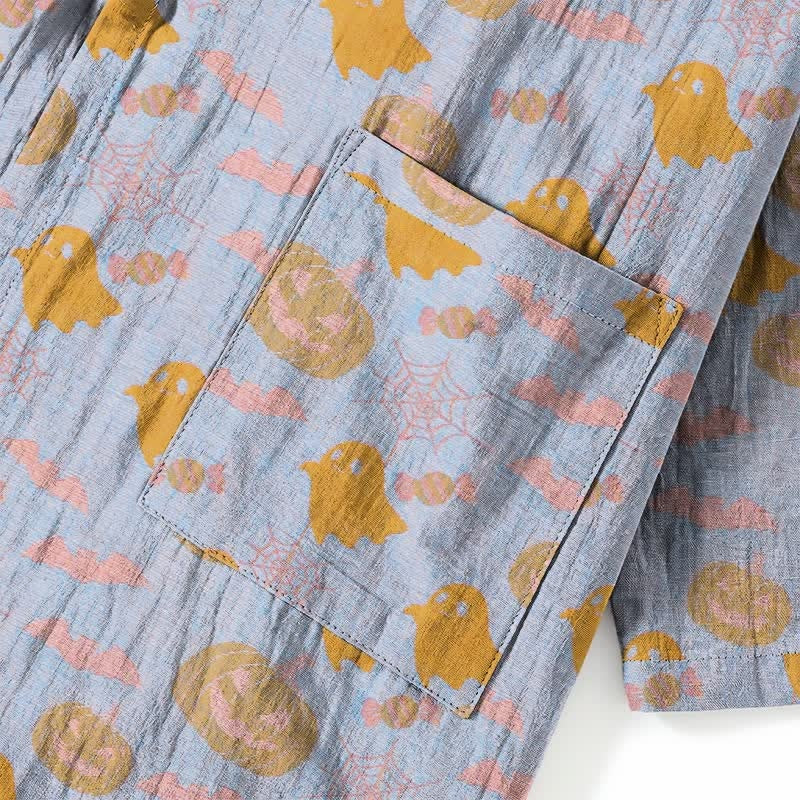 Blue fabric with gold ghosts and pumpkins, pocket detail close-up | Chaps London