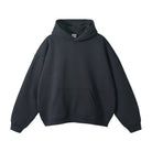 Black oversized hoodie with kangaroo pocket, shown flat, front view | Chaps London