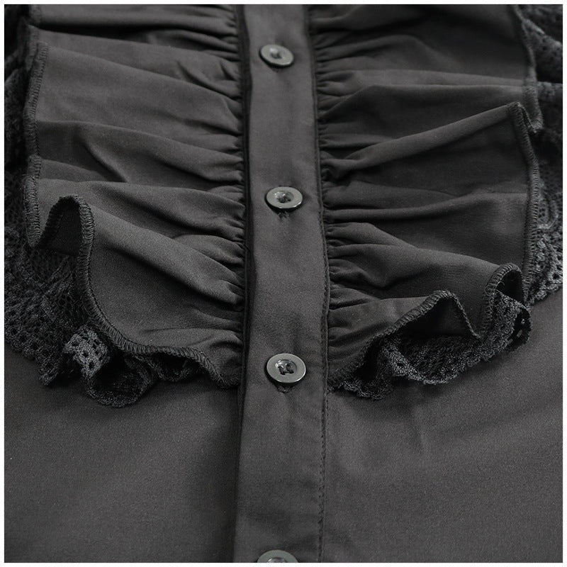 Black ruffled shirt with lace trim, close-up view, worn by person | Chaps London
